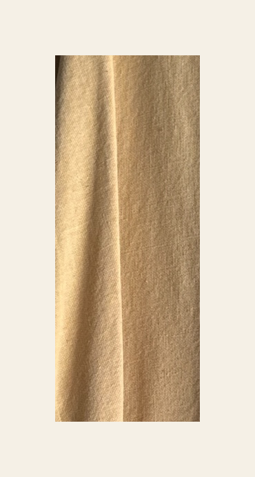Acercamiento de la textura de la tela beige