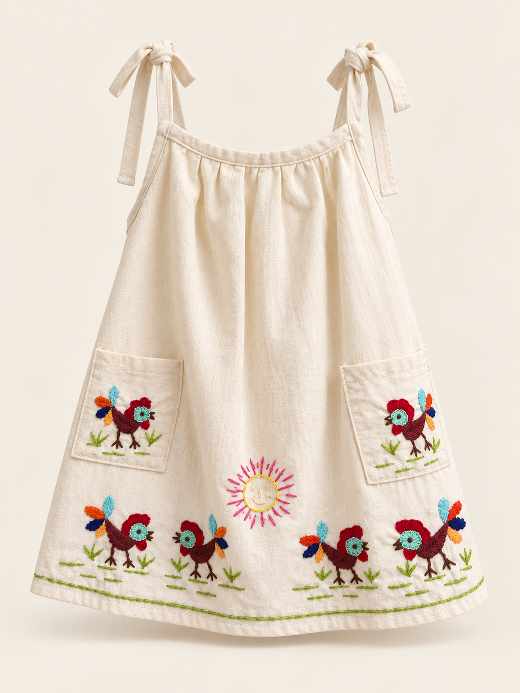 Vestido de niña bordado La Granja con bolsillos: vista principal (imagen ilustrativa creada con IA)