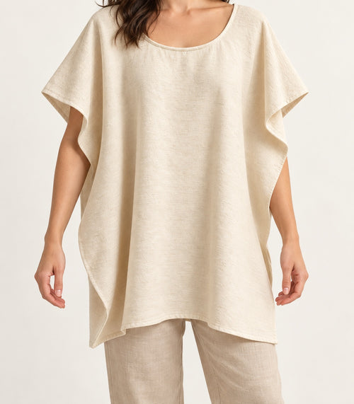 Blusa amplia de manta lisa en look cotidiano