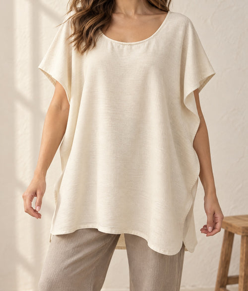 Blusa amplia de manta lisa, puesta